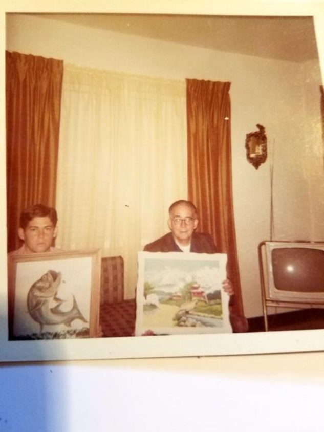 image of family members holding their art