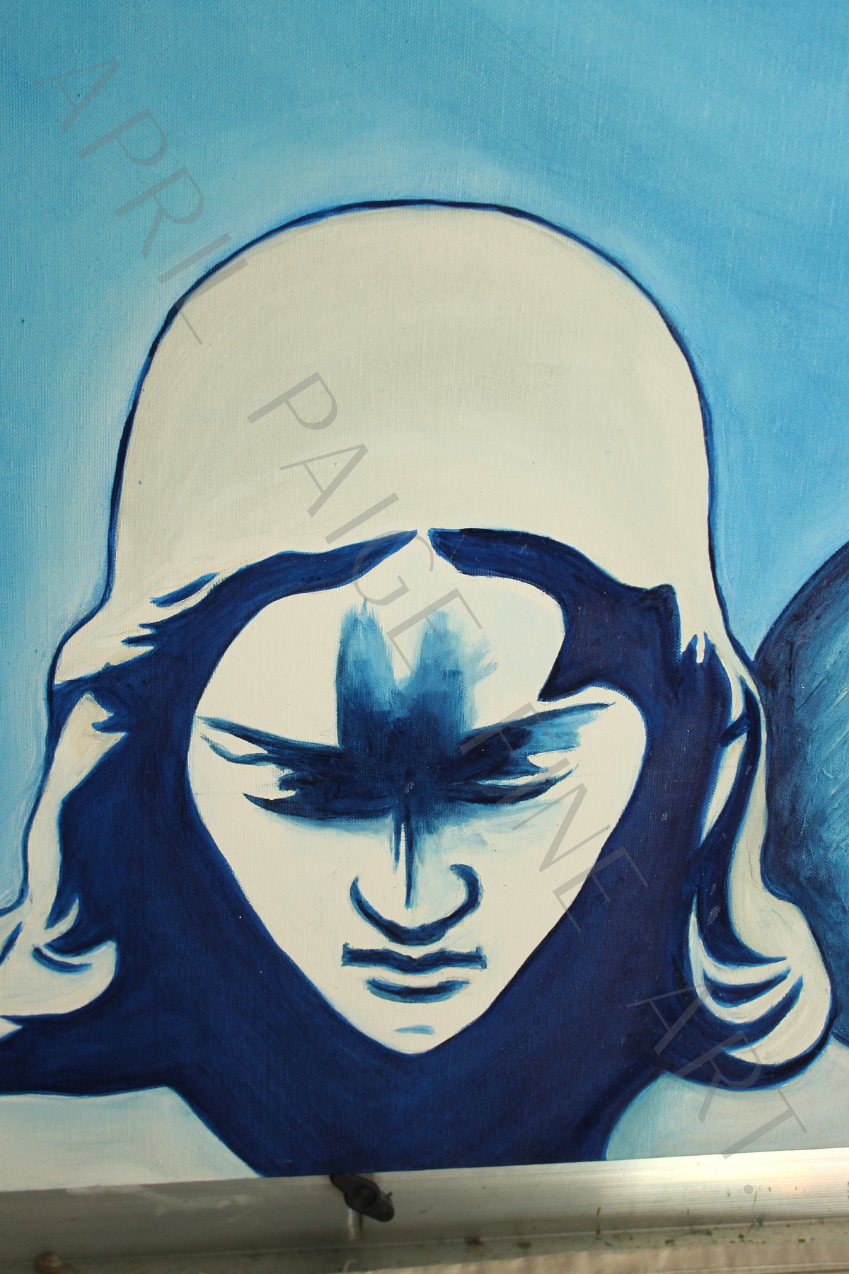 Artwork of a face with blue and white colors on a blue background.