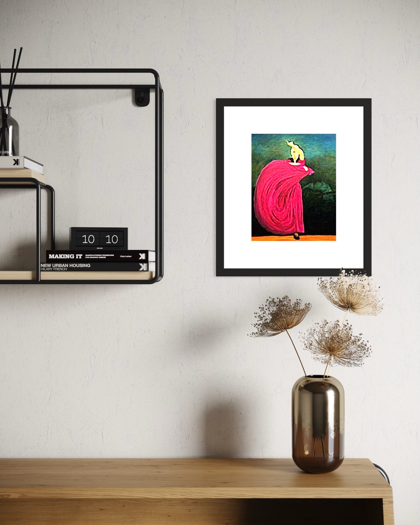 Framed archival print of a flamenco dancer about to perform in a deep pink dress, with a guitarist faintly seen in the background.  The print shown with a white mat and black frame.  In front is a wooden desk, a vase with dried flowers, and a industrial shelf with books and a calendar.  Great for any modern den, office, music room, bedroom, or living room.  